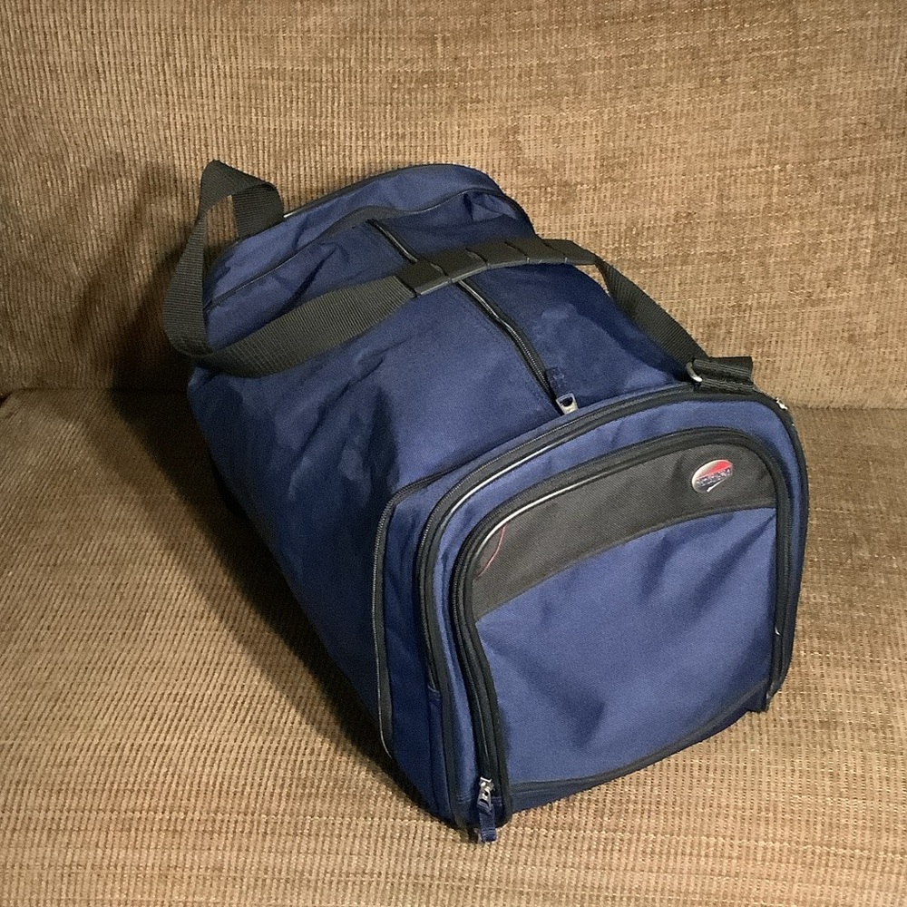 American Tourister Navy collapsible duffle bag